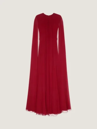 Aftonklänning i silkeskrepp med cape