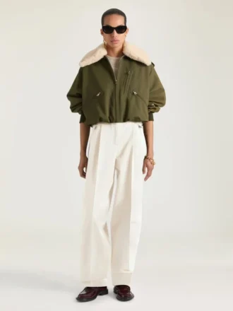 Bomberjacka i bomull och ull med krage i fårskinn