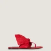 Boudoir-tongsandaler i nappaläder med rosett Boudoir-tongsandaler i nappaläder med rosett