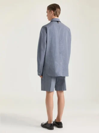 Bermudashorts i bomull med dubbla veck och rutmönster