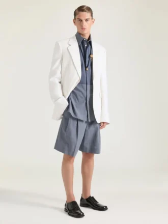 Bermudashorts i bomull med dubbla veck och rutmönster