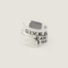 Givenchy Tape Earcuff i metall och emalj Givenchy Tape Earcuff i metall och emalj