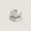 Givenchy Tape Earcuff i metall och emalj Givenchy Tape Earcuff i metall och emalj