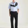 Skjorta i poplin med surrealistiskt tryck Skjorta i poplin med surrealistiskt tryck