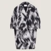Kappa i ulljacquard med djurmönster Kappa i ulljacquard med djurmönster
