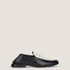 Label-loafers i läder och canvas Label-loafers i läder och canvas