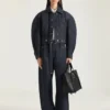 Medium Snatch-väska i kornat läder Medium Snatch-väska i kornat läder