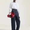 Medium Voyou Bag i glansigt läder Medium Voyou Bag i glansigt läder