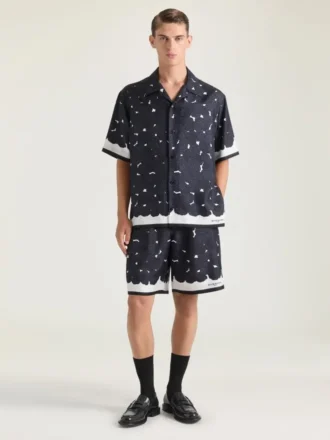 Bermudashorts i siden med blommönster