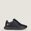 Sneakers i glansigt vadderat läder Sneakers i glansigt vadderat läder