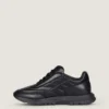 Sneakers i glansigt vadderat läder Sneakers i glansigt vadderat läder