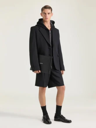 Stor påse i läder med Antigona-prägling