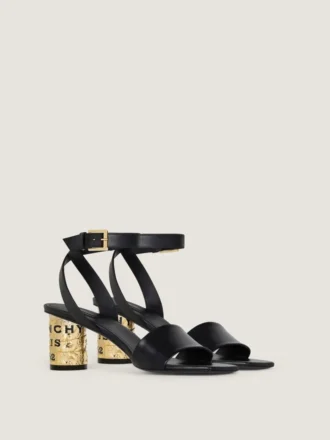 Tejpklädda klacksandaler i läder